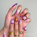 Prime- Purple Flower handmade press-on nails with floral designs and gem details.