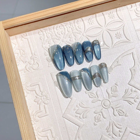 Blue Sky handmade press-on nails with elegant designs by Glitify, perfect for a salon-quality look at home.